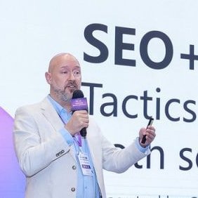 Charles Coxhead giving a keynote talk on stage